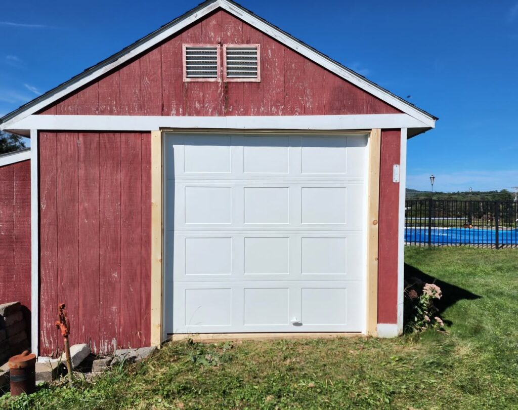 new garage doors near Bainbridge, NY - white garage door on a barn